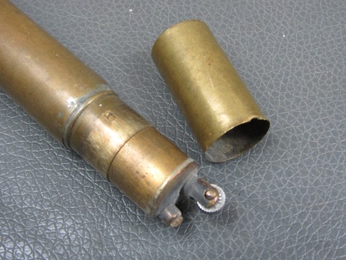 Antique brass trench art